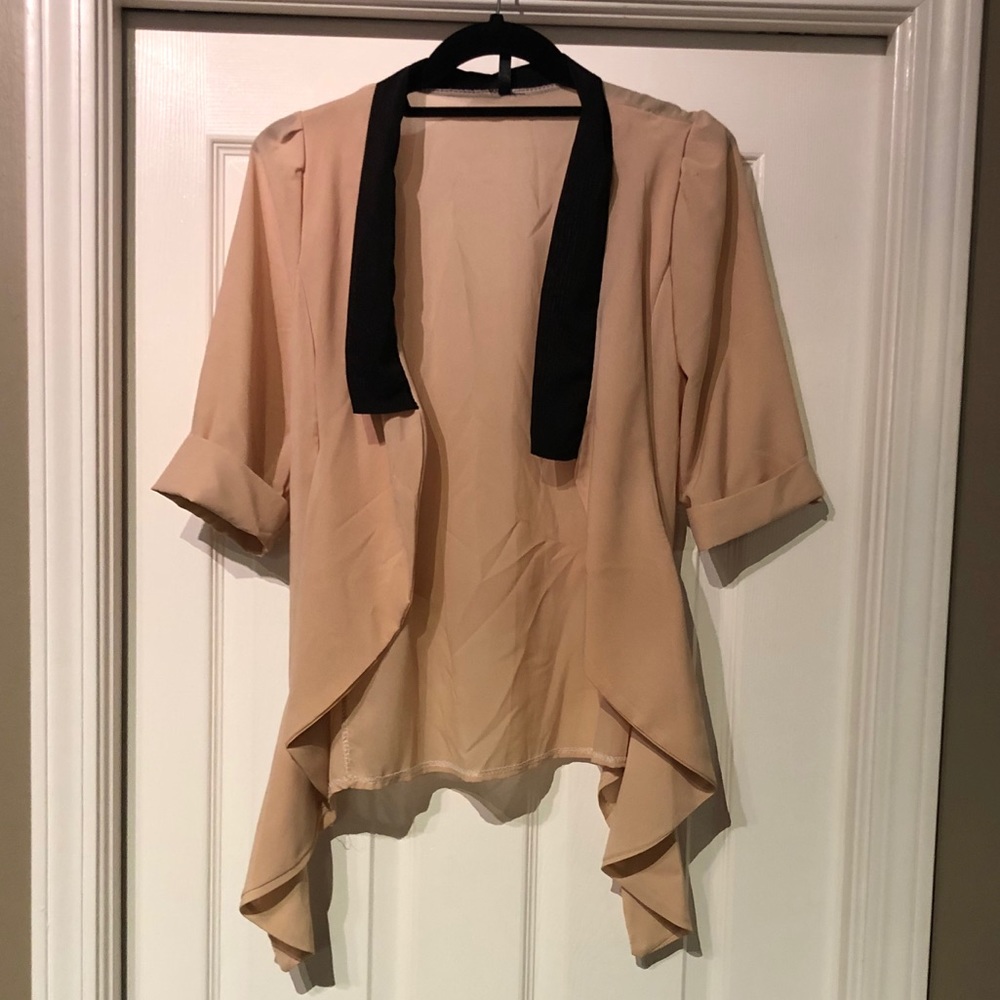 Sleek beige and black cardigan